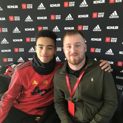 Zane Pilkington pictured with a Manchester United player